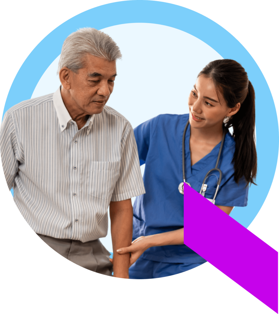 A healthcare professional in scrubs helping her patient successfully leave the hospital